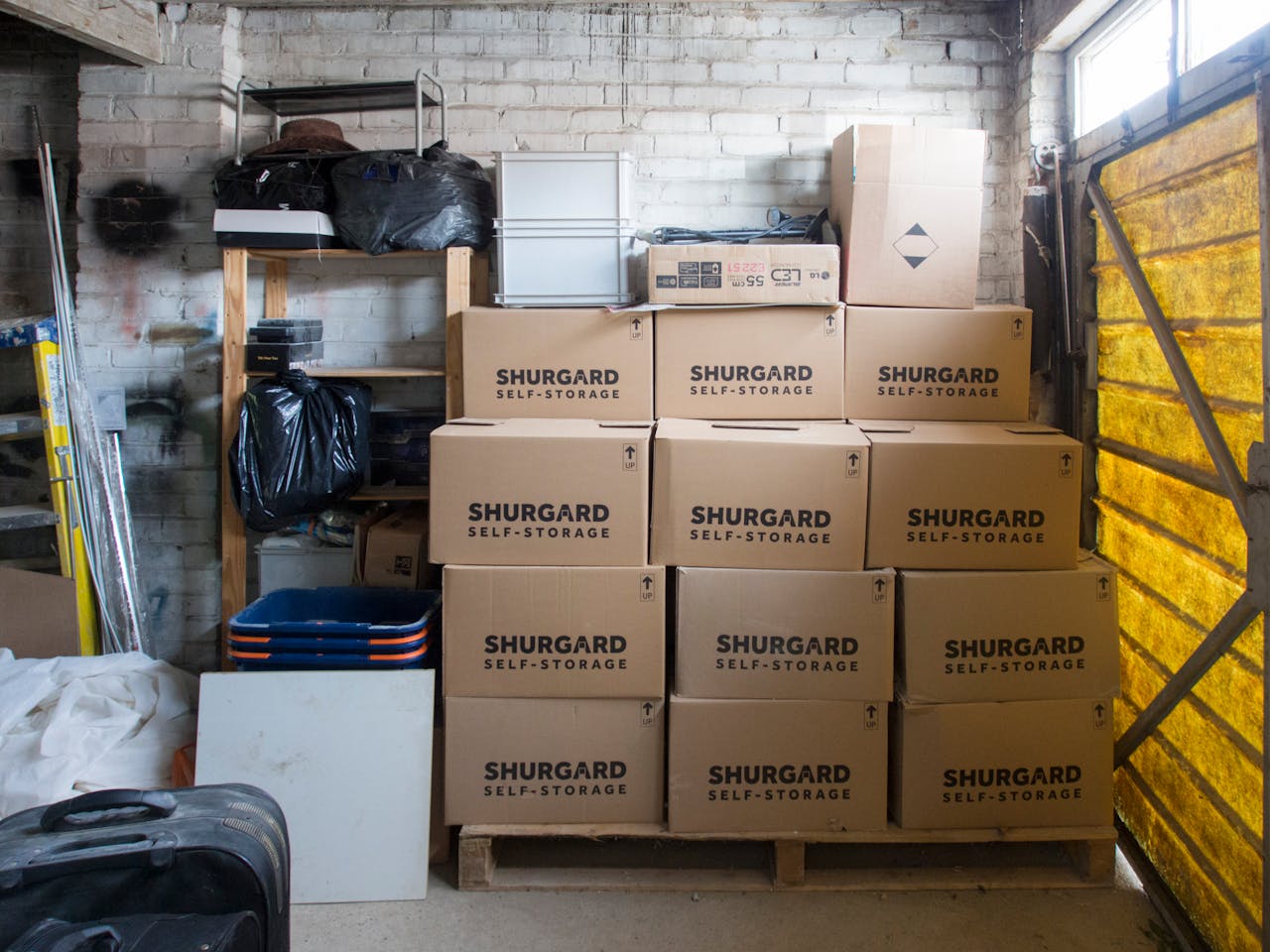 The Art of Drawing Readers In: Your attractive post title goes here A stack of storage boxes in a well-organized warehouse interior.